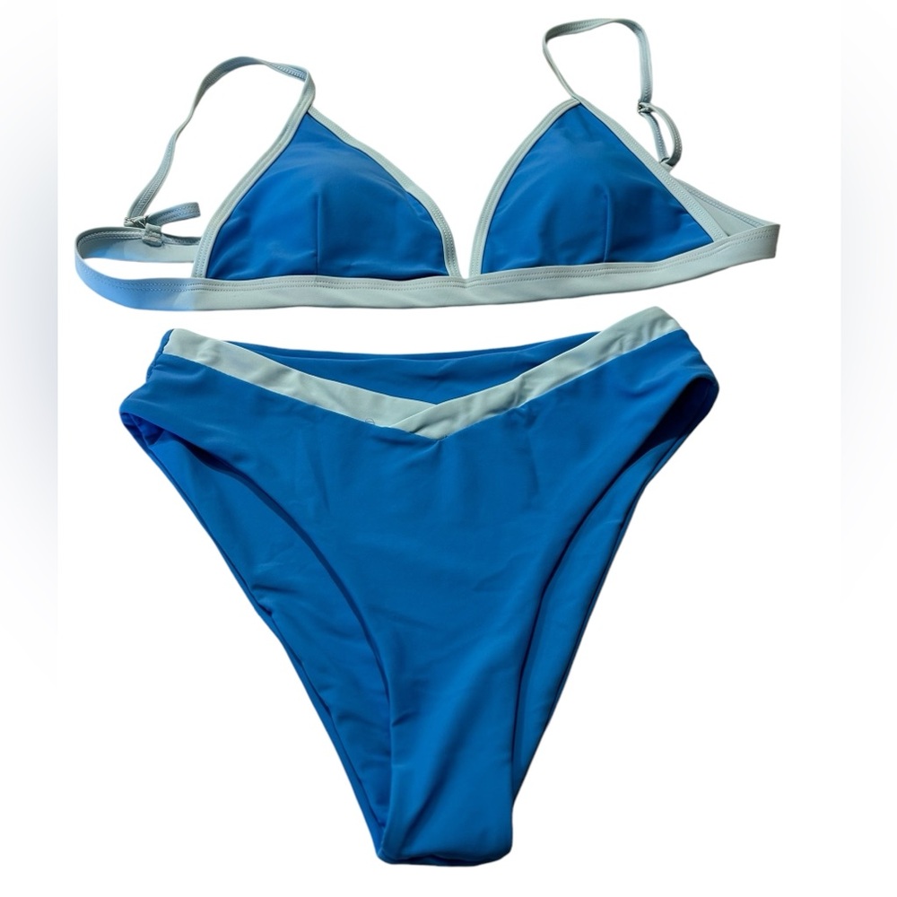 A very pretty, modest bikini in two tones of blue.  Unbranded and NWOT.